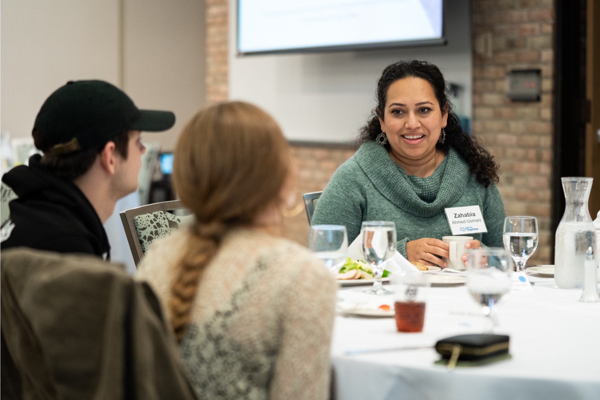 people talking at table